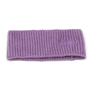 Detail of purple ribbed knit headband featuring Haseprings embroidery and thick texture