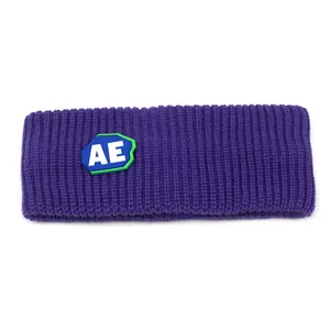 Purple cable knit headband for women with athletic AE letter patch and warm ribbed texture