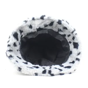 Winter fluffy faux fur bucket hat with stylish black and white dalmatian spot pattern