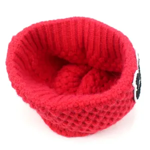 Red knit beanie with honeycomb texture and letter R patch for winter warmth
