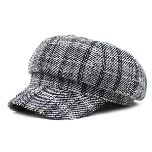 Classic black and white plaid tweed newsboy cap with vintage British octagonal style