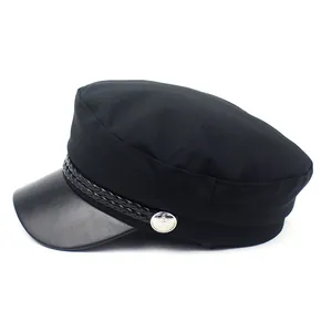 Women's black newsboy cap with faux leather visor and braided cord detail