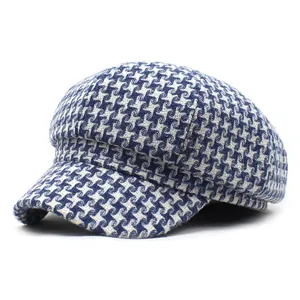 Classic blue and white houndstooth newsboy cap with vintage octagonal top and short brim