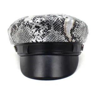 Women's faux leather newsboy cap with snake skin pattern top and black flat brim