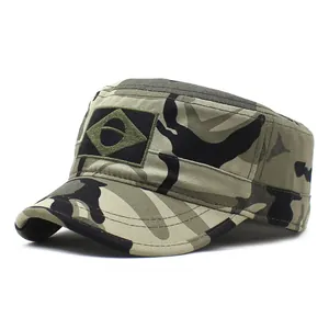 Men's camouflage flat top military hat with flag patch in a 45-degree side view