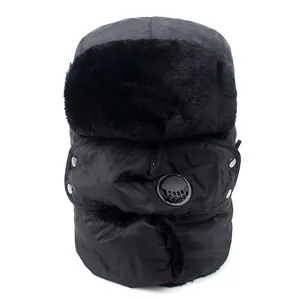 Detailed view of winter ushanka hat with integrated face mask and black breathing valve