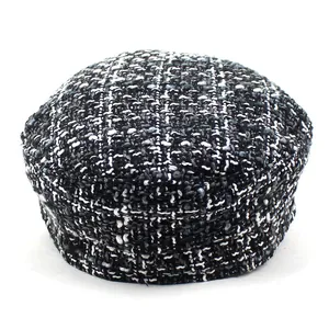 Vintage black and white tweed newsboy hat for women with a structured flat top