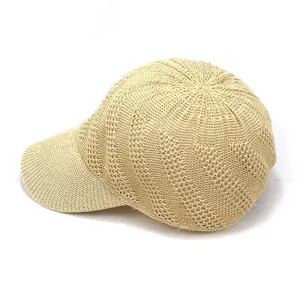 Detail of breathable woven straw texture on beige baseball cap for summer sun protection