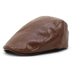 Close-up of brown PU leather flat cap showing detailed stitching and premium texture