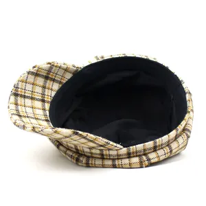 British style yellow plaid newsboy cap with classic check pattern and black lining