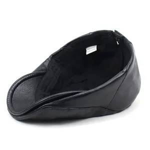 Classic black faux leather flat cap with grainy texture and high-quality stitching detail