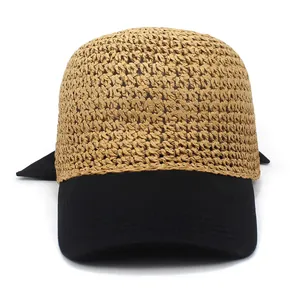 Berretto da baseball in paglia da donna con tesa nera e fiocco decorativo sul retro