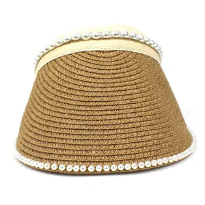 Women's straw open top sun hat with pearl trim and wide brim for summer beach vacation