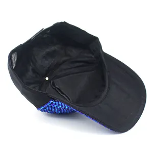 Fashion baseball cap with blue and purple rhinestones on a curved brim and side