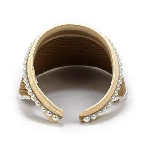 Straw sun visor hat with pearl brim detail for women and open-top design for beach wear
