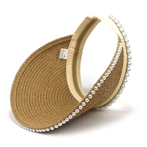 Women's khaki straw sun hat with wide brim, elegant pearl trimming, and open top design