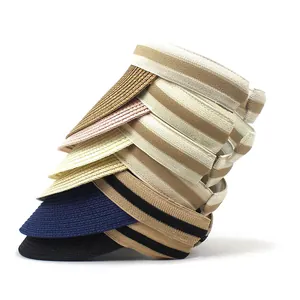 Detail view of woven sun visors in five colors with striped elastic headbands