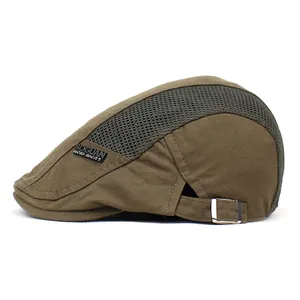 Detail of brown mesh patchwork newsboy cap featuring a side adjustable metal buckle
