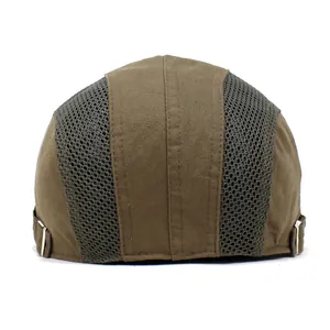 Close-up of mesh side panels and adjustable silver metal buckle on the flat cap