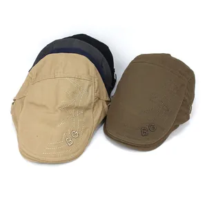 Close-up of five color options and B.G embroidery on classic cotton ivy flat caps