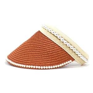 Close-up of pearl embellishments on a woven straw sun hat with an open top design