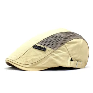 Beige breathable mesh patchwork flat cap with metal buckle and letter label