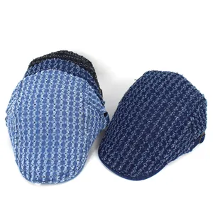 Distressed denim newsboy caps in multiple blue washes with metal buckle detail