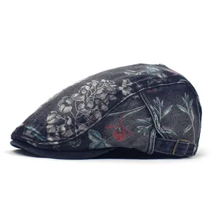 Washed denim beret cap with vintage floral print and adjustable metal side buckle