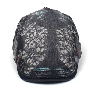 Washed denim flat cap with vintage floral and bird prints in dark grey color