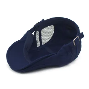 Detailed view of the dark blue cotton beret with breathable mesh and adjustable metal buckle