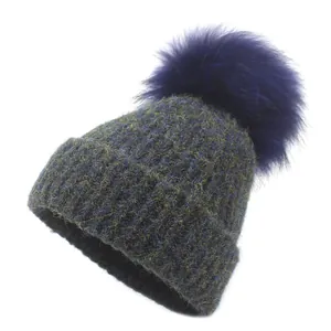 Colorful mixed knit beanie for women with warm ribbed cuff and large faux fur pompom
