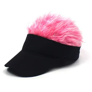 Detail view of funny baseball cap featuring black fabric and pink faux hair wig top