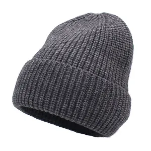 Close-up of dark grey cotton cashmere knit beanie showing detailed ribbed texture