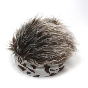 Detail of a hip-hop knit hat with gray faux hair wig and leopard print headband