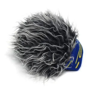 Detailed view of novelty beanie with vibrant blue knit and fluffy grey faux hair wig top