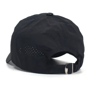 Detail view of black breathable mesh baseball cap with laser-cut holes and metal buckle