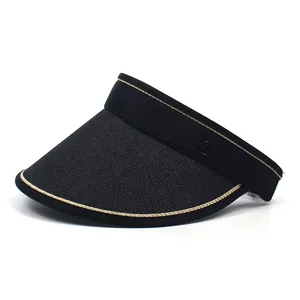 Foldable black paper straw sun visor with wide brim and gold trim for women