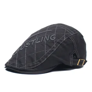 Men's black cotton beret cap featuring quilted diamond patterns and Bustling embroidery