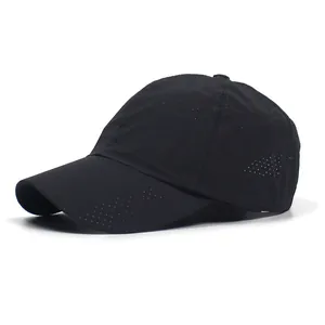 Close-up of black breathable mesh fabric and curved brim on lightweight golf cap