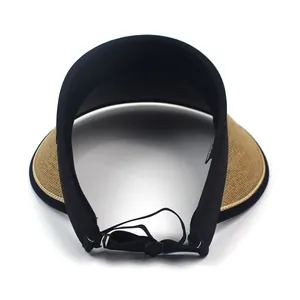 Detail of adjustable elastic drawstring and woven straw brim on sun visor hat