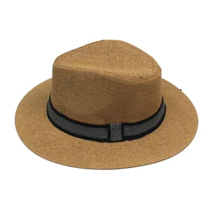 Close-up of a wide-brim straw fedora showing breathable weave and striped band