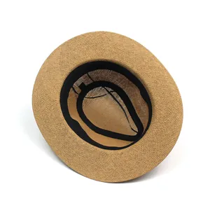 Breathable khaki straw sun hat with wide brim and black sweatband for summer beach wear