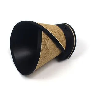 Close-up of foldable straw sun hat showing portable roll-up design and metallic logo