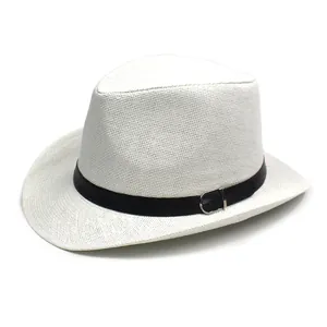 Macro shot of white straw Panama hat weave with black leather belt and silver buckle