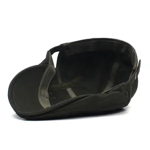 Detail view of cotton flat cap interior showing durable stitching and sweatband