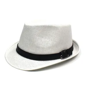 Detail of white woven fedora hat with black leather band and silver metal buckle