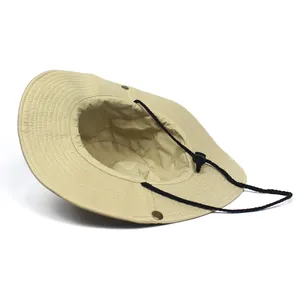 Detail of khaki wide brim sun hat showing adjustable wind cord and metal side snaps