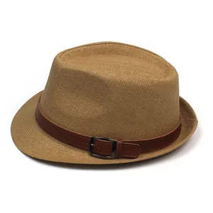 Close-up of khaki woven straw hat with a dark brown leather belt and metal buckle