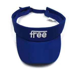 Detail of dark blue cotton sun visor with white free embroidery and adjustable strap