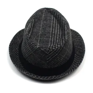 Top-down view of a classic grey plaid fedora hat with a black decorative band